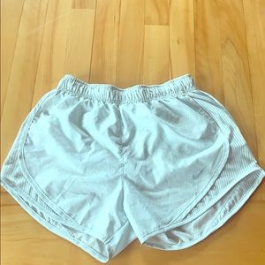 Teal Dri-Fit Nike shorts.